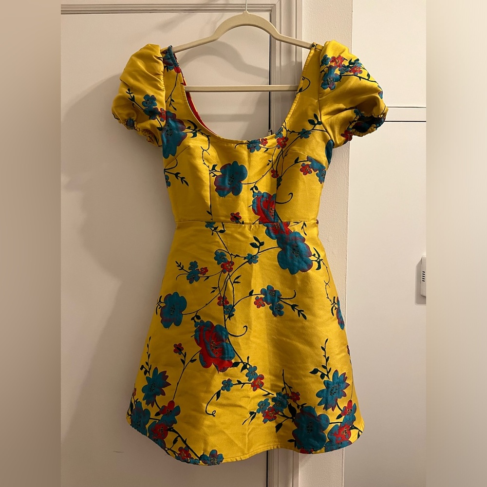 LPA 697 in canary dress.